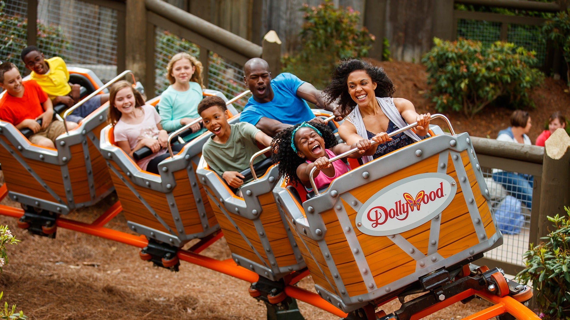 people riding a roller coaster