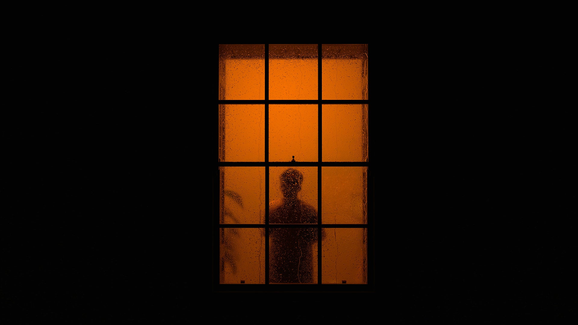 halloween ghost of a boy in the window
