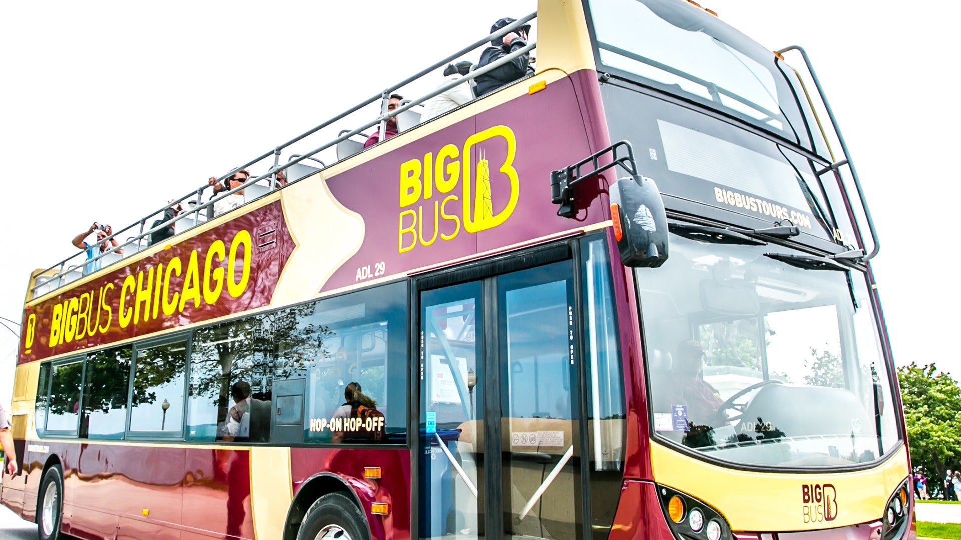 trolley bus tour with people aboard it