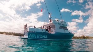 group of people on a boat about to go snorkeling
