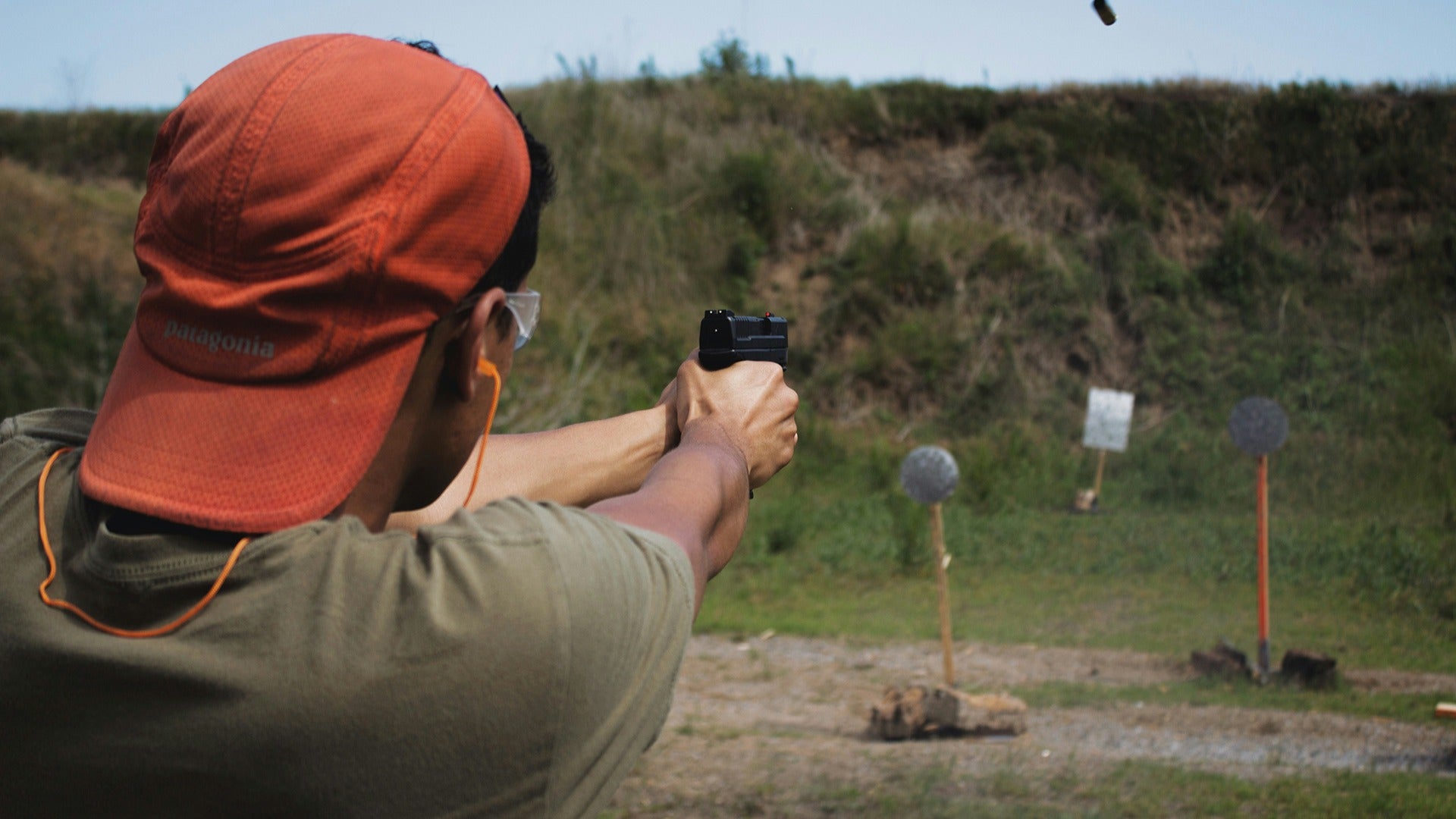 a man in an outdoor shooting range