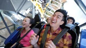 group of people in a roller coaster