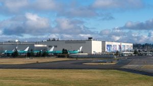 an airport with planes and a tarmac