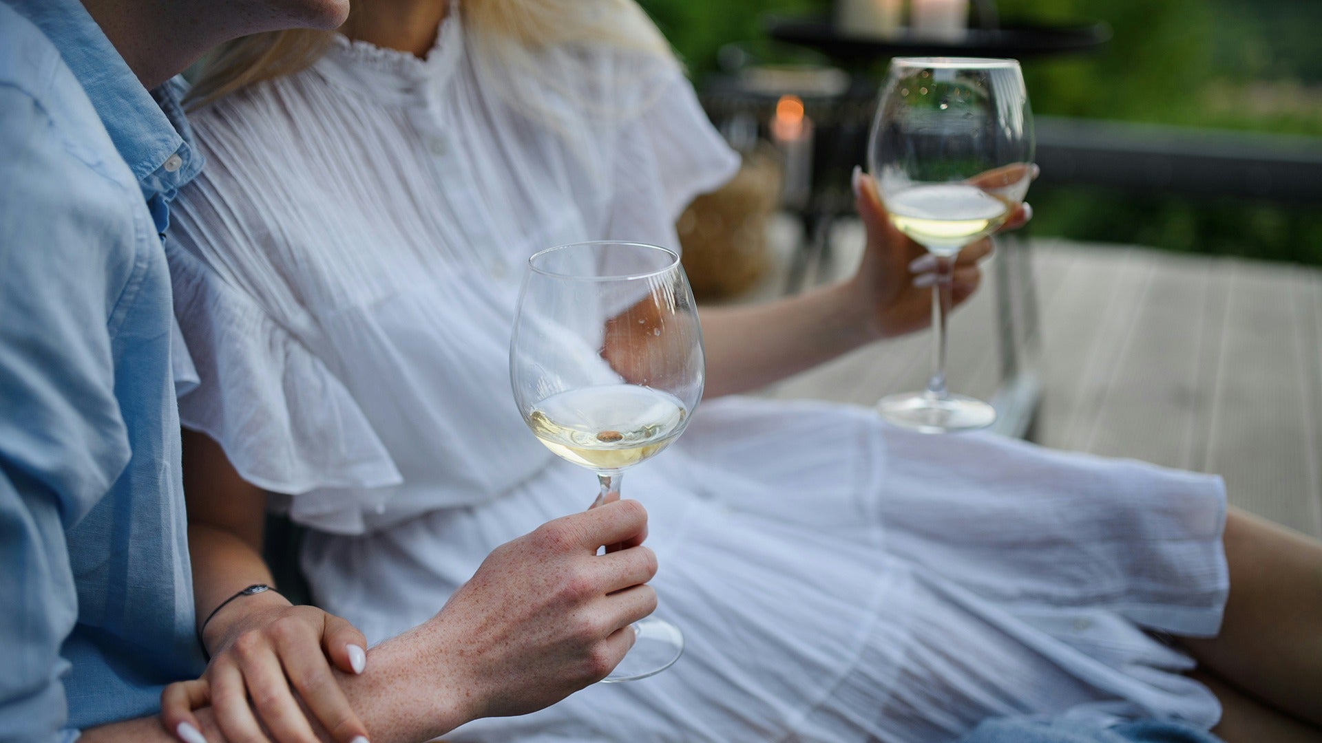 a couple drinking wine together
