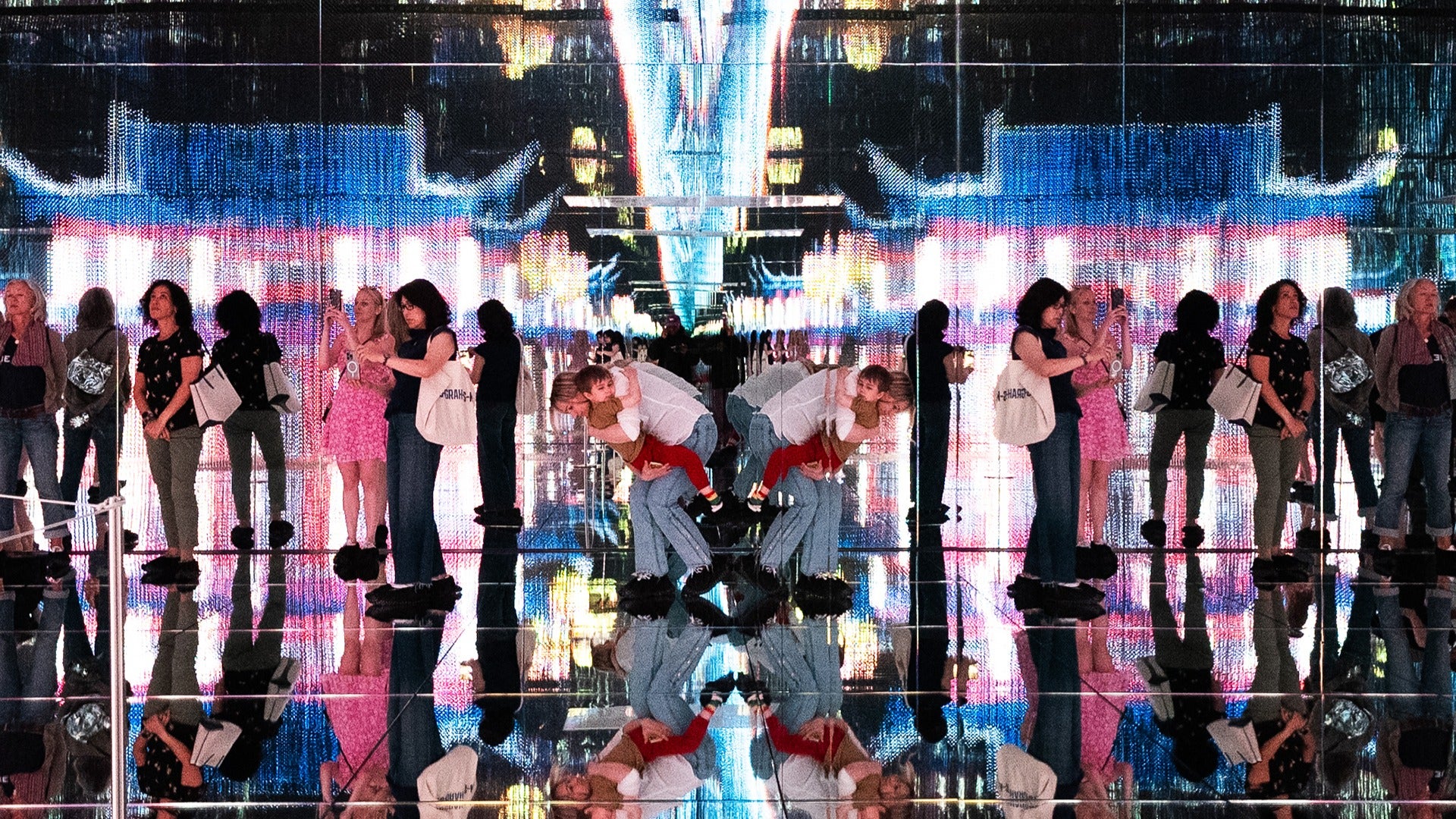 a group of people in a museum exhibit