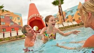a family having fun in a pool