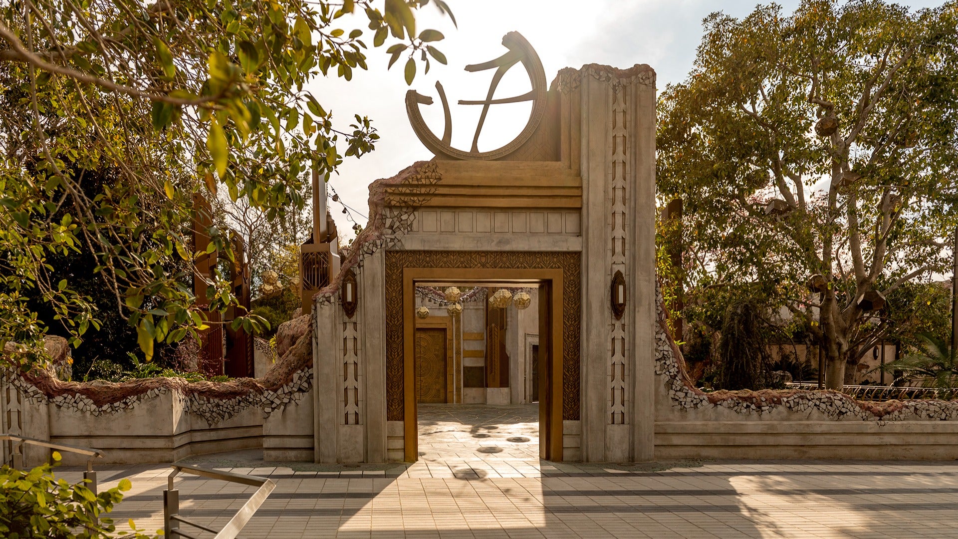 the avengers sanctum with ruins and trees surrounding it