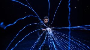 a magician performing tricks with special effects