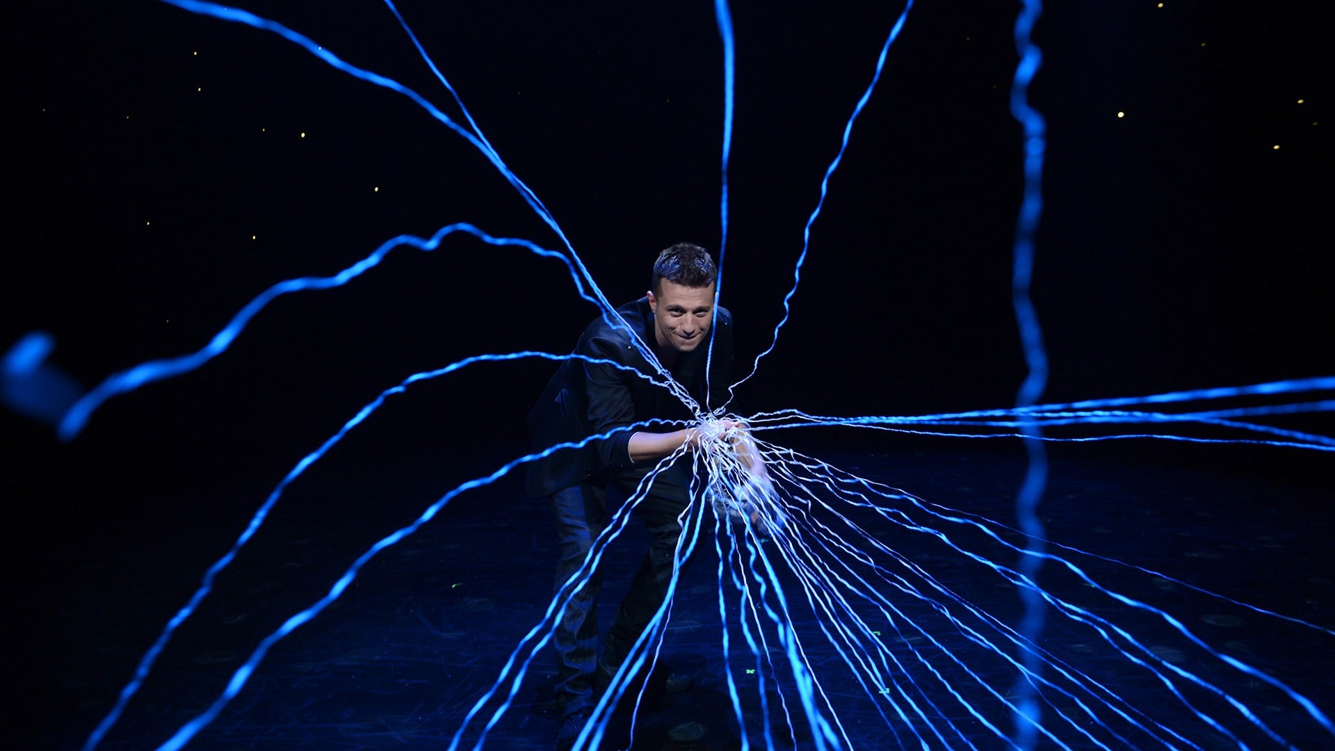 a magician performing tricks with special effects