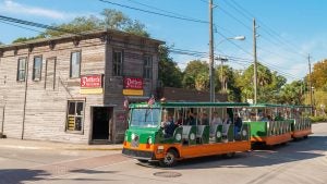 a trolley tour passing by the potter's wax museum