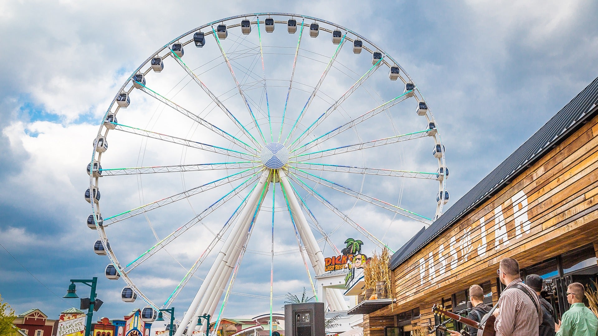 a ferris wheel with people staring at it