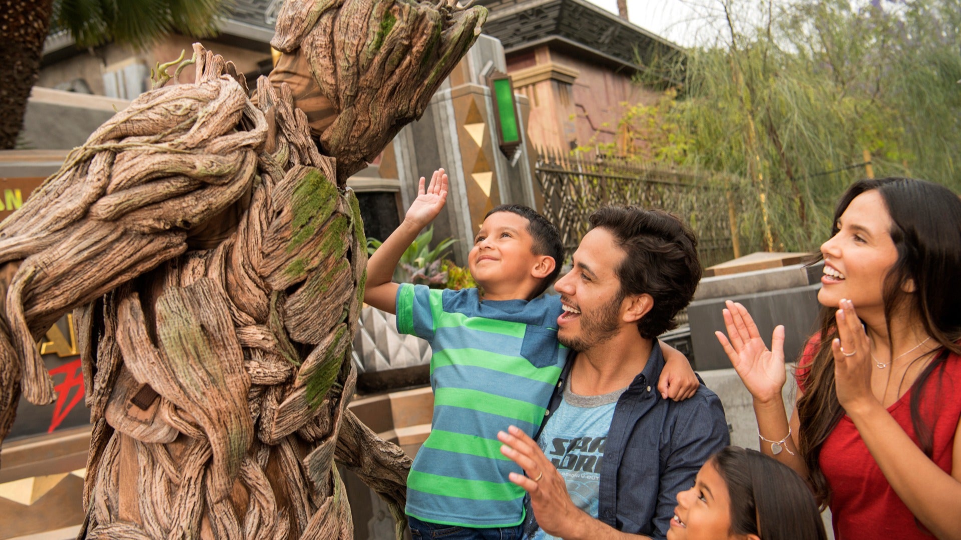 a disney character meeting a family