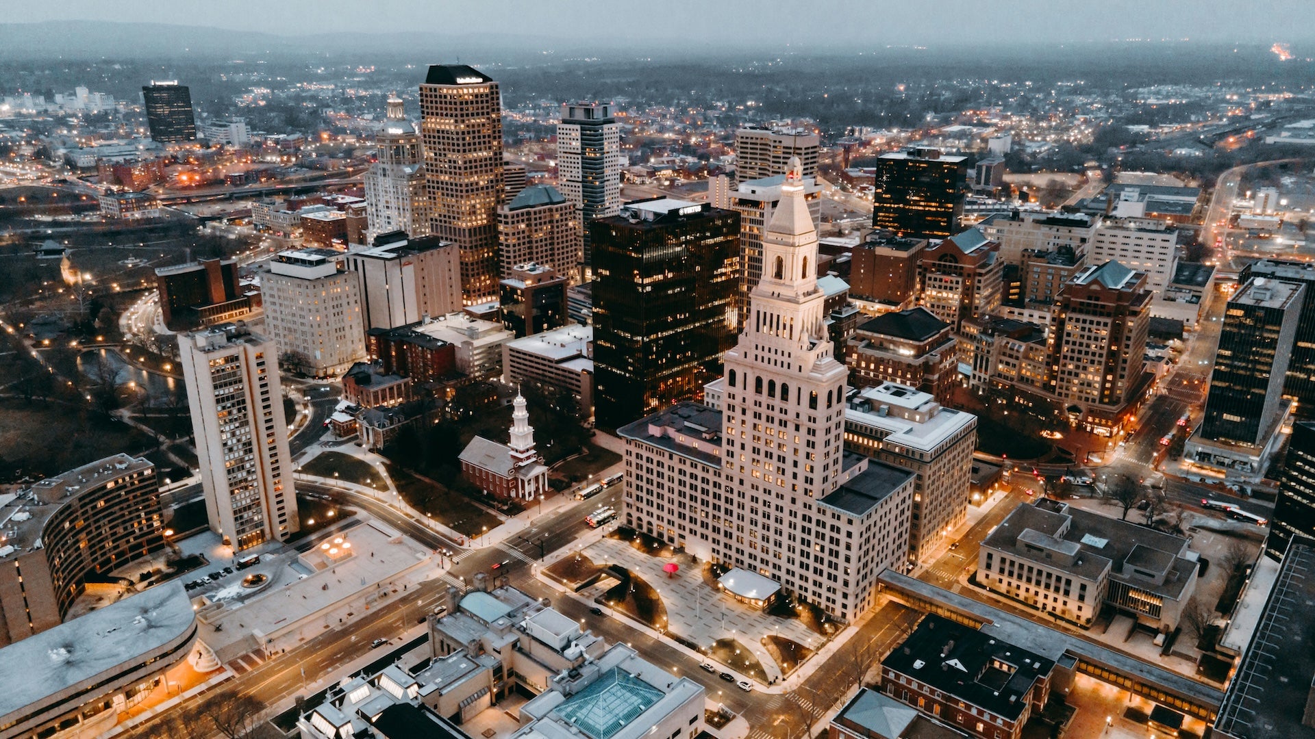 Downtown cityscape at dusk shot from above
