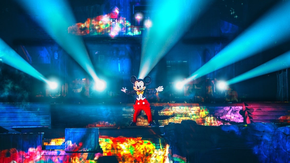 Sorcerer Mickey with lights shining all around him