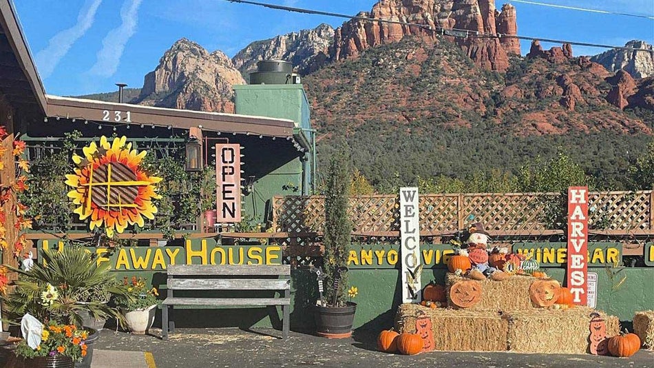 exterior of Hideaway House Restaurant with mountains in the background in Sedona, Arizona, USA