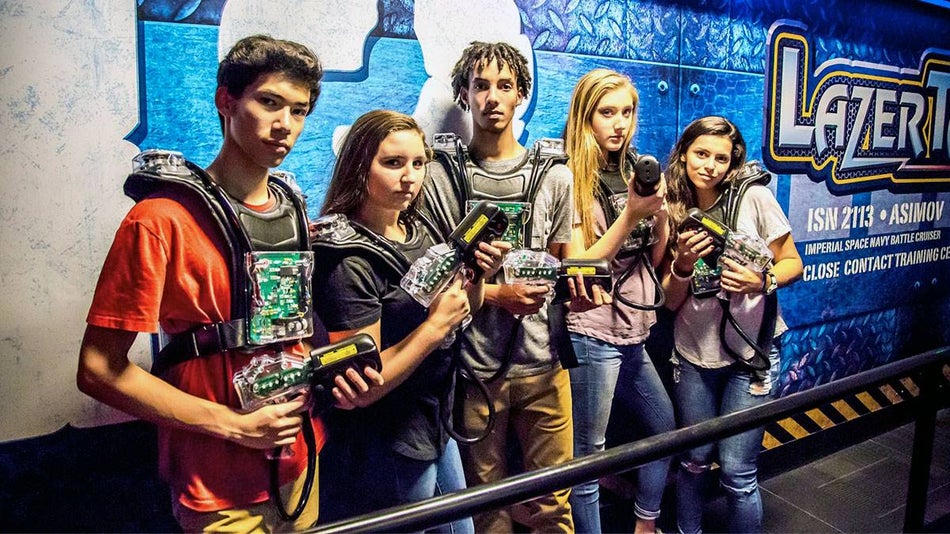 kids in Laser Tag gear posing for photo for Laser Tag at WonderWorks in Pigeon Forge, Tennessee, USA