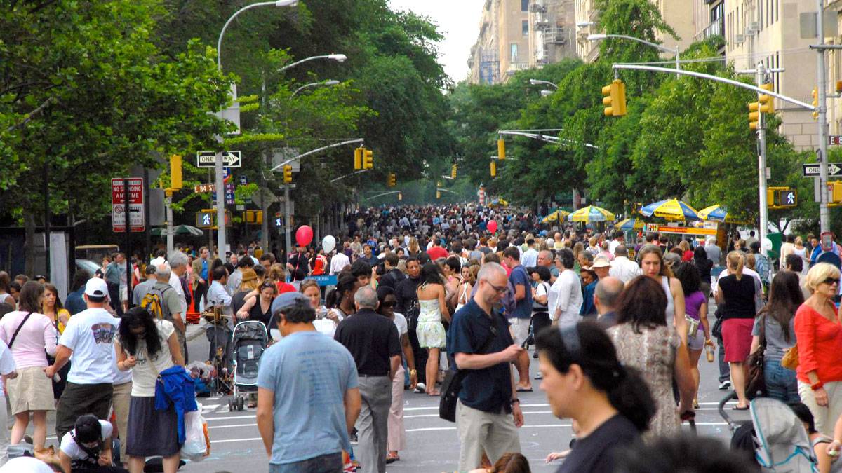 crowd in the streets for Museum Mile Festival during the daytime in New York City, New York, USA