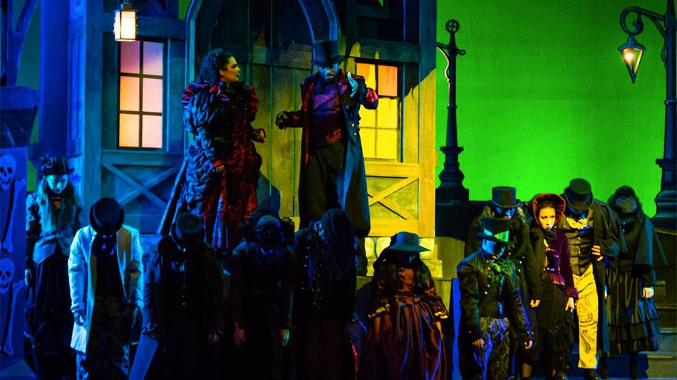 performers in costume under moody colorful lighting at Seaworld San Antonio in San Antonio, Texas, USA