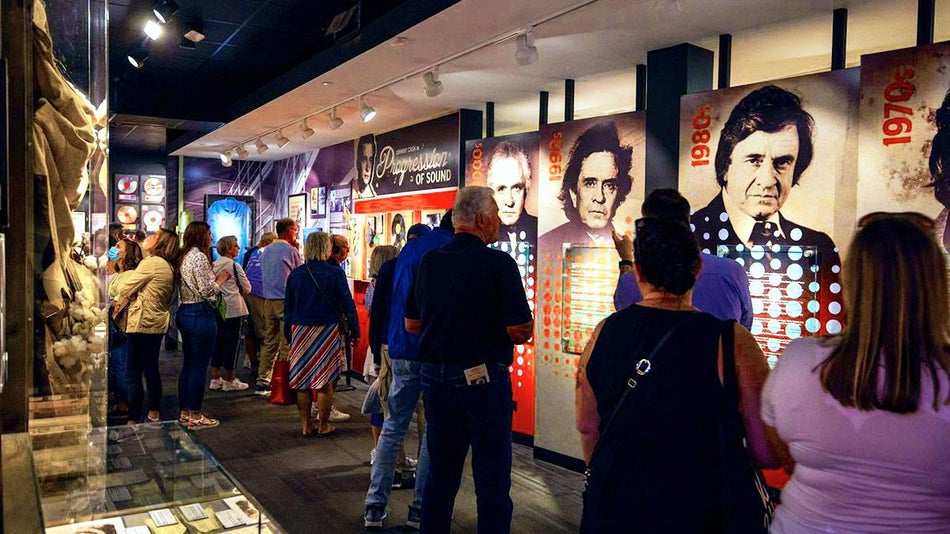 people viewing exhibit inside Johnny Cash Museum Nashville, Tennessee, USA