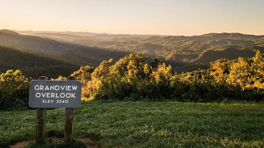 View from Grandview Overlook on the Mountains-to-Sea Trail at sunset in Asheville, North Carolina, USA
