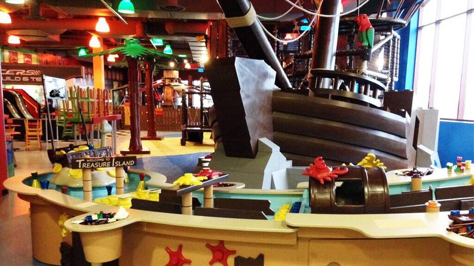 Wide shot of a LEGO pirate ship and play area at the Pirate Adventure Island at the LEGOLAND Discovery Center in Chicago, Illinois, USA