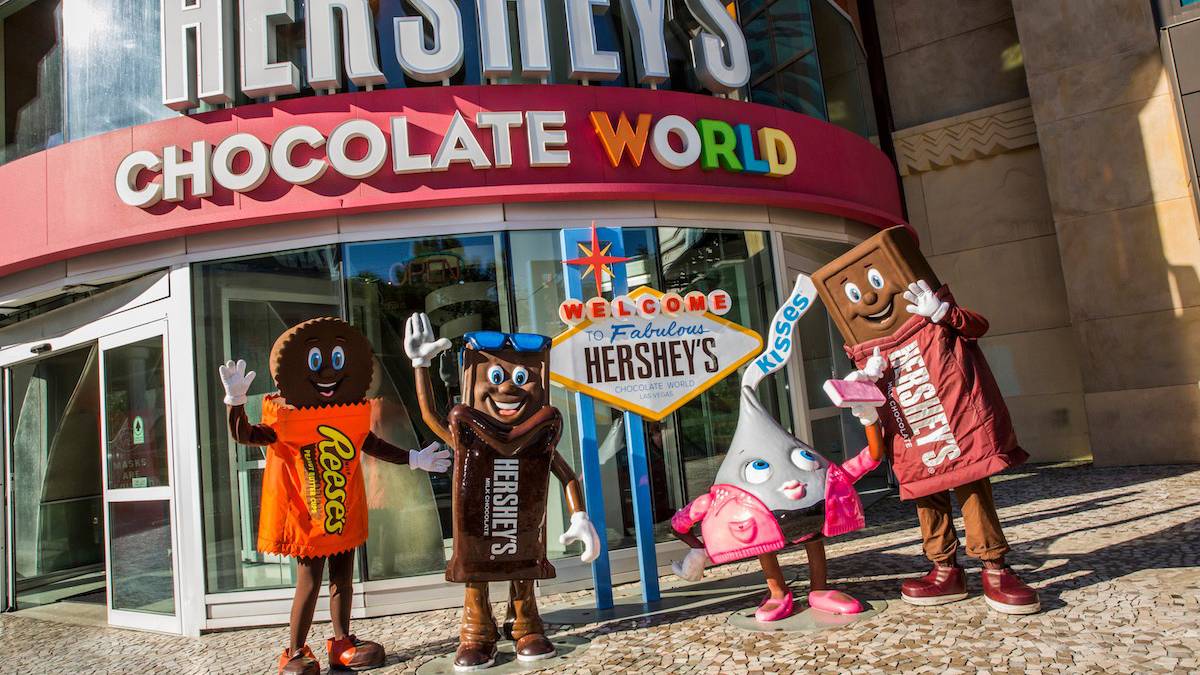 Close up of the entrance to Hershey's Chocolate World with different chocolate mascots standing in front of it in Las Vegas, Nevada, USA