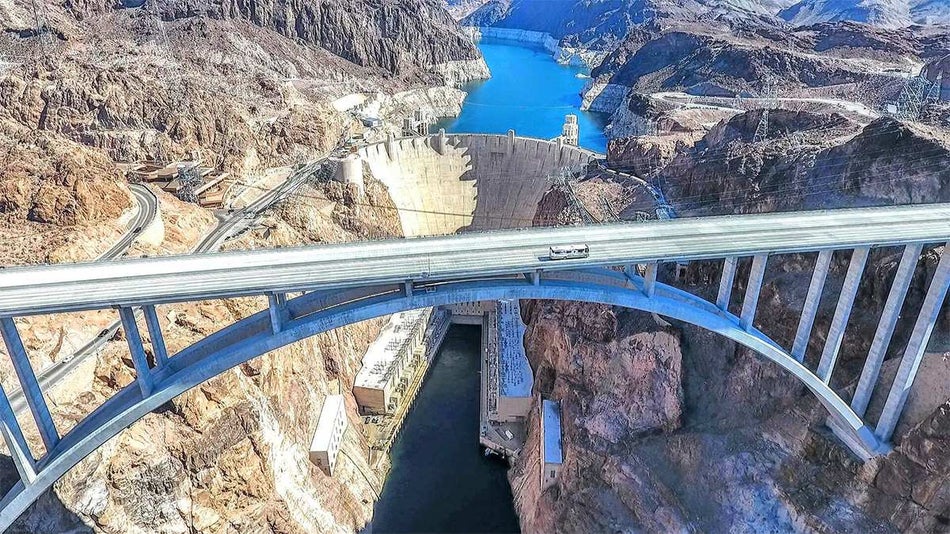 View looking down on the Mike O'Callaghan-Pat Tillman Memorial Bridge with eh Hoover Damn in the background on a sunny day near Las Vegas, Nevada, USA
