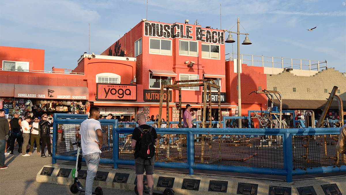 View of the outdoor gym and large red at Muscle Beach on a sunny day in Los Angeles, California, USA