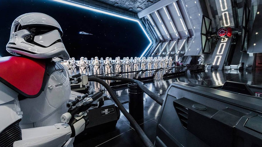 Close up of a Storm Trooper with a gun plus an army of storm troopers behind him on Rise of the Resistance at Walt Disney World in Orlando, Florida, USA