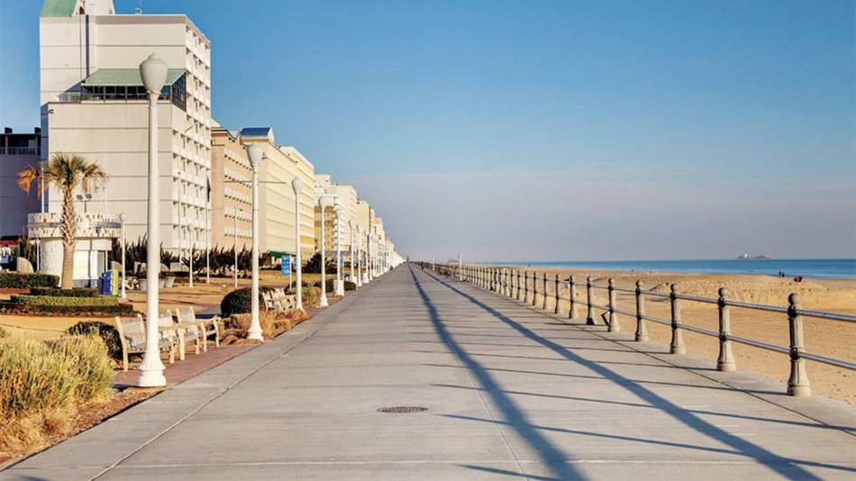 Ground view of the boardwalk at Virginia Beach on a sunny day with no traffic in Virginia Beach, Virginia, USA